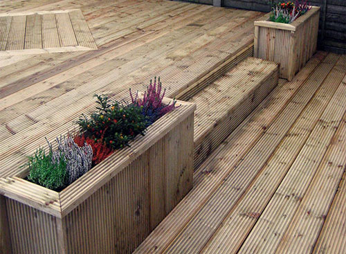 Decking with pattern and flower boxes